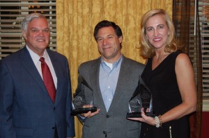 CACI President Chuck Berry (left), Dave Tabor, and Tricia Smith hold awards received at the Association of State Chamber Professionals annual recognition ceremony.  